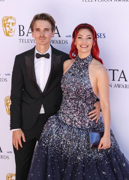 Joe Sugg and Dianne Buswell pose for a photo at the BAFTA Television Awards.