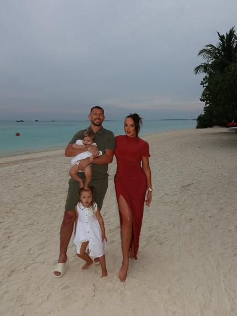 Charlotte Letitia Crosby with her family on a beach.
