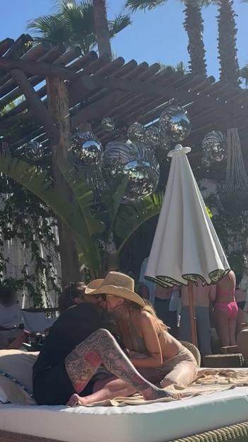 Olivia Attwood and Pete Wicks kissing at the Nikki Beach club in Saint Tropez.