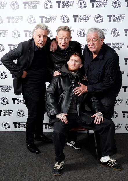 Glen Matlock, Paul Cook, Steve Jones, and Frank Carter of the Sex Pistols pose for a photo.