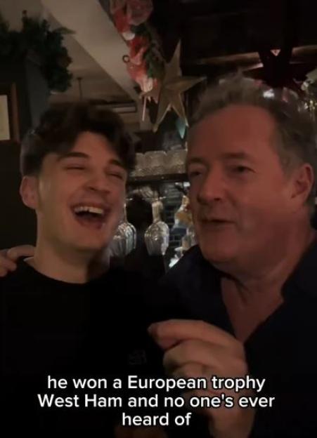 Piers Morgan and Joe Sandell at a Christmas party.