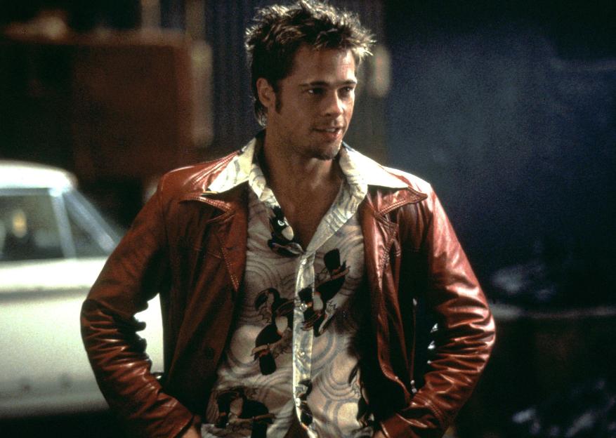 Brad Pitt in Fight Club, wearing a red leather jacket and patterned shirt.