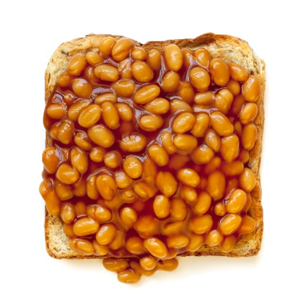 Baked beans on a piece of toasted whole-wheat bread.