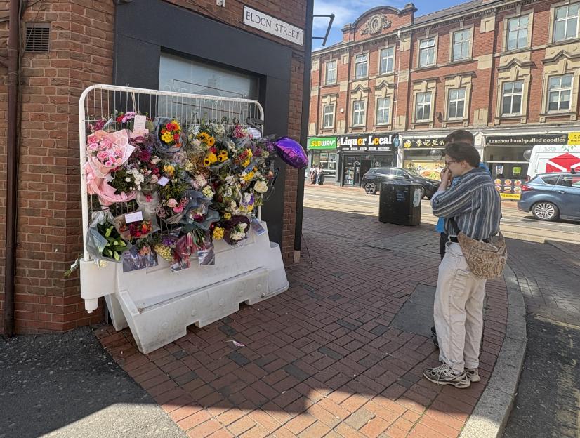 Floral tributes left at the scene of the alleged murder of Shanice Brookes on West Street in Sheffield.