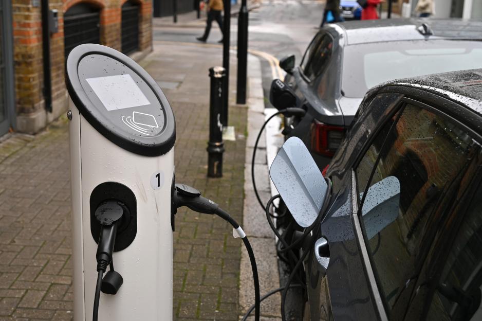 An electric vehicle charging via a Source London on-street charger in London.
