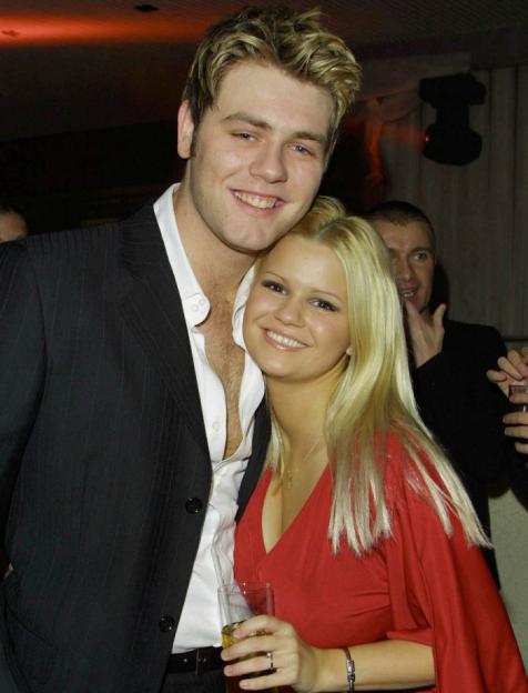Brian McFadden and Kerry Katona smiling at Westlife's World of Our Own launch party.