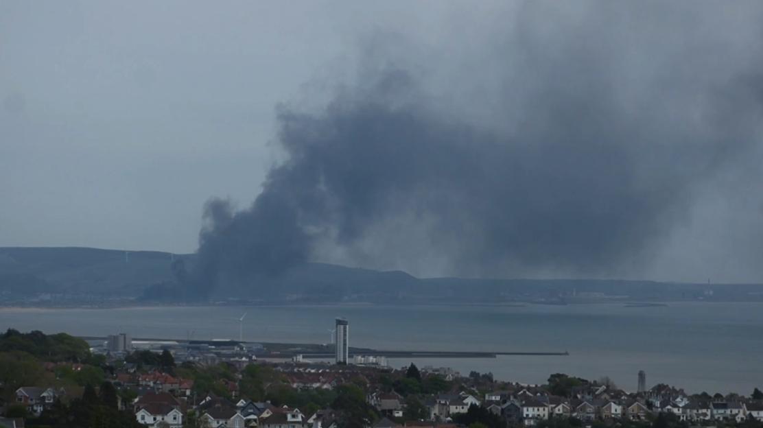 Massive Fire Breaks Out at Industrial Facility, Thick Black Smoke Visible for Miles — Authorities Urge Residents to Stay Clear