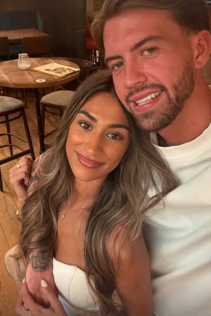 Priya Gopaldas and Aidan in a close-up selfie confirming their relationship status.