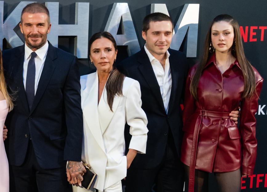 David Beckham, Victoria Beckham, Brooklyn Beckham and Nicola Peltz pose at the Netflix 'Beckham' UK premiere.