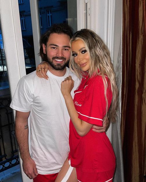 Olivia Attwood and her husband Bradley Dack smiling and embracing.