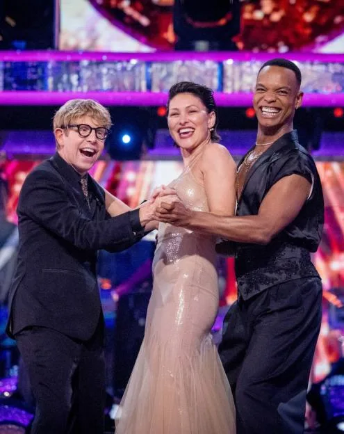 Three people on the set of Strictly Come Dancing 2026.