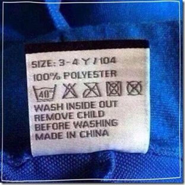 Clothing tag with instructions including "REMOVE CHILD BEFORE WASHING".