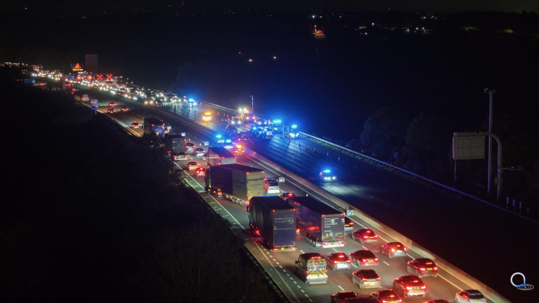 Woman, 30, and girl, 15, arrested after Kia driving wrong way down M1 smashes into car – as man rushed to hospital