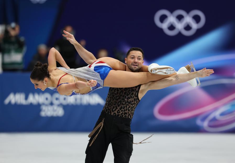 Lilah Fear and Lewis Gibson of Great Britain performing in the Ice Dance Rhythm Dance of the Figure Skating Team Event at the Milano Cortina 2026 Winter Olympic Games.