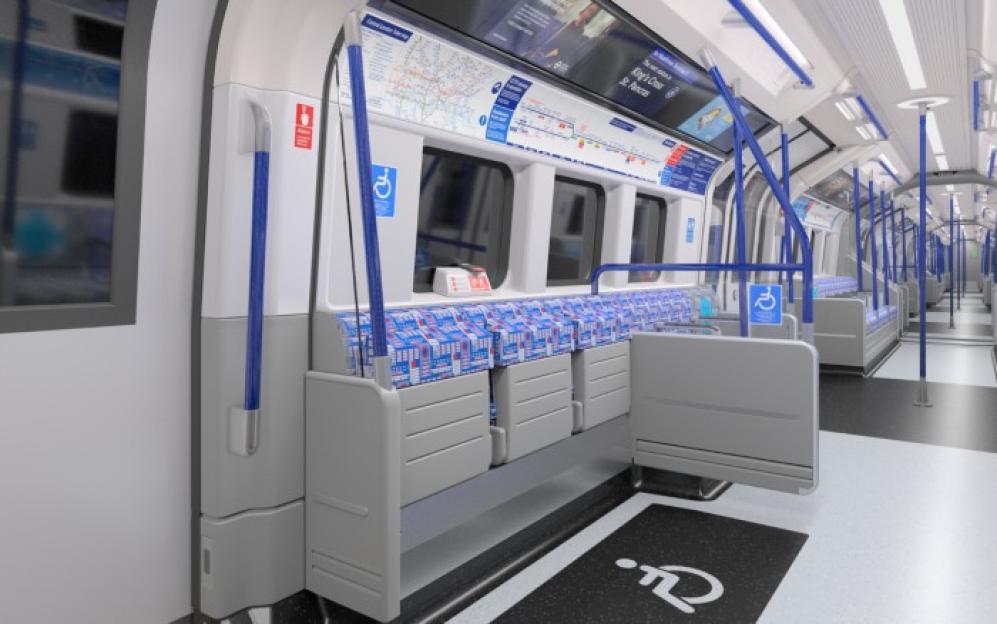 Illustration of the interior of a modern subway car with blue and white seats, blue handrails, and accessibility signs.