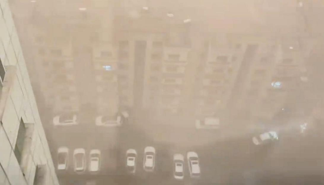 Powerful sandstorm triggers wall of thick dust swallowing city skyline in seconds