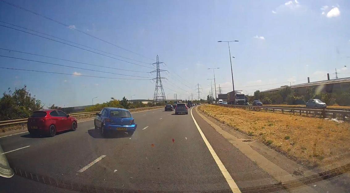 "Stunning Car Flip Captured on A-Road After Collision Leaves Three Injured"