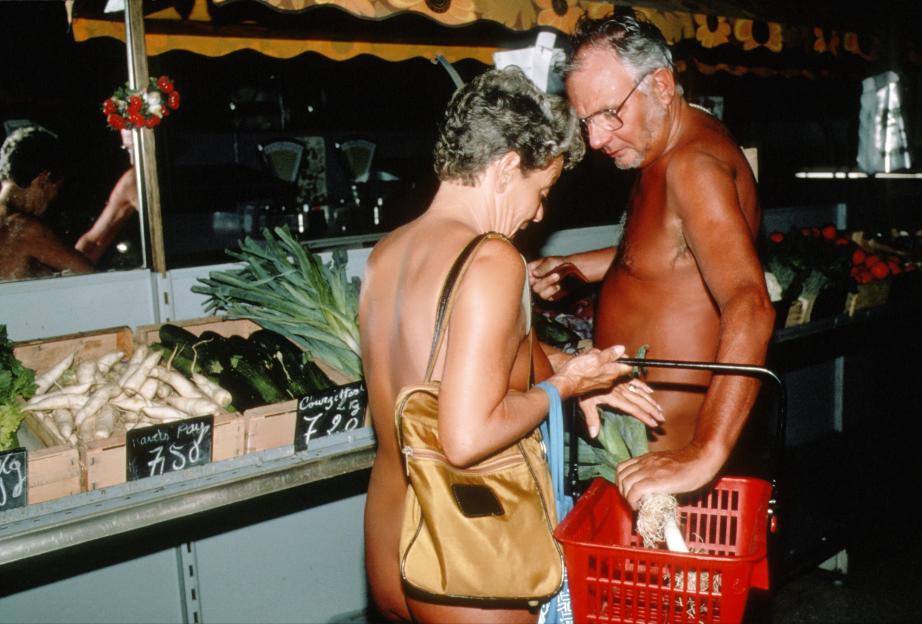 Photo of naturists grocery shopping.