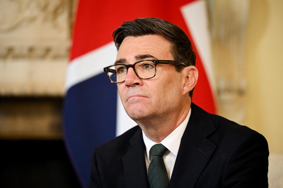 Britain's Prime Minister Andy Burnham looks on during a meeting.