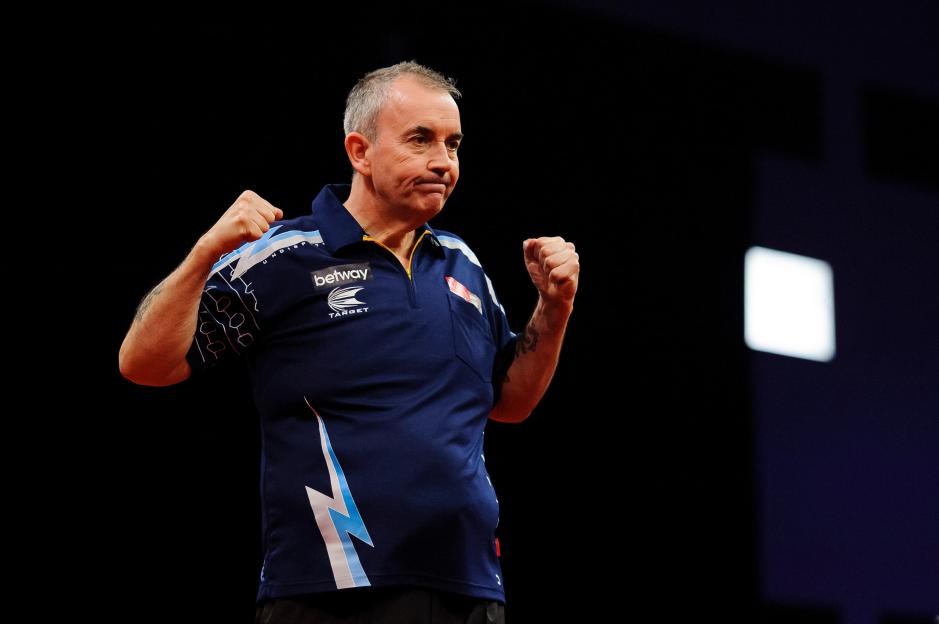 Exeter, UK. 06th Mar, 2014. Phil Taylor celebrates after his match against Robert Thornton which he wins 7-5 during Judgement Night of the Betway Premier League Darts at the Motorpoint Arena. Credit: Action Plus Sports/Alamy Live News
