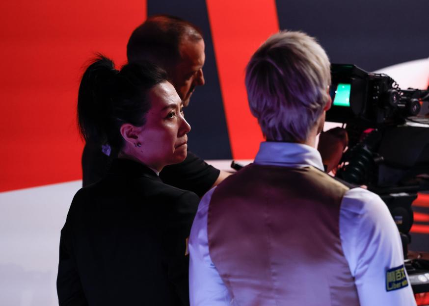 Sheffield, UK. 26th Apr, 2026. Referee Peggy Li speaks with Neil Robertson as she reviews video of a foul committed by Chris Wakelin (not pictured) during the Chris Wakelin vs Neil Robertson Halo World Championship 2026 match at The Crucible, Sheffie