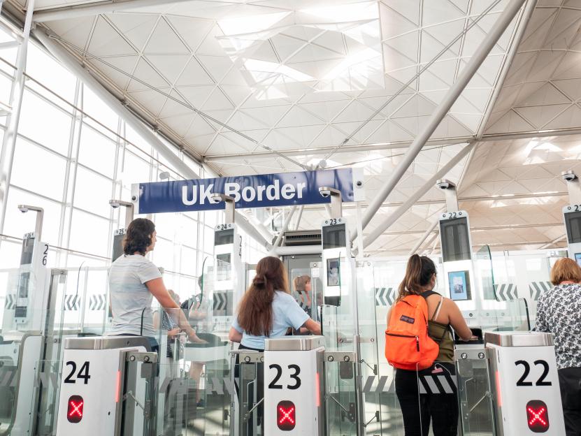 Passengers using ePassport gates at UK Border control in Stansted Airport.