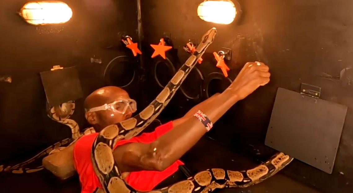 Mo Farah in a "Viper Pit" challenge surrounded by snakes during "I'm A Celebrity... Get Me Out Of Here! South Africa".