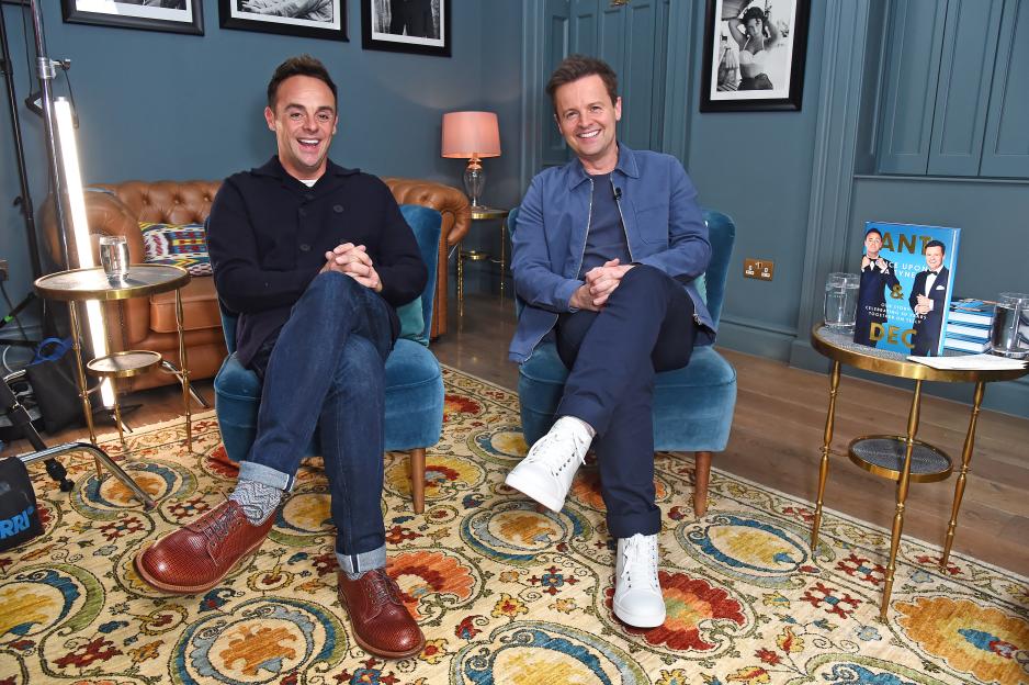 Anthony McPartlin and Declan Donnelly posing backstage at their "In Conversation With Ant & Dec" event.