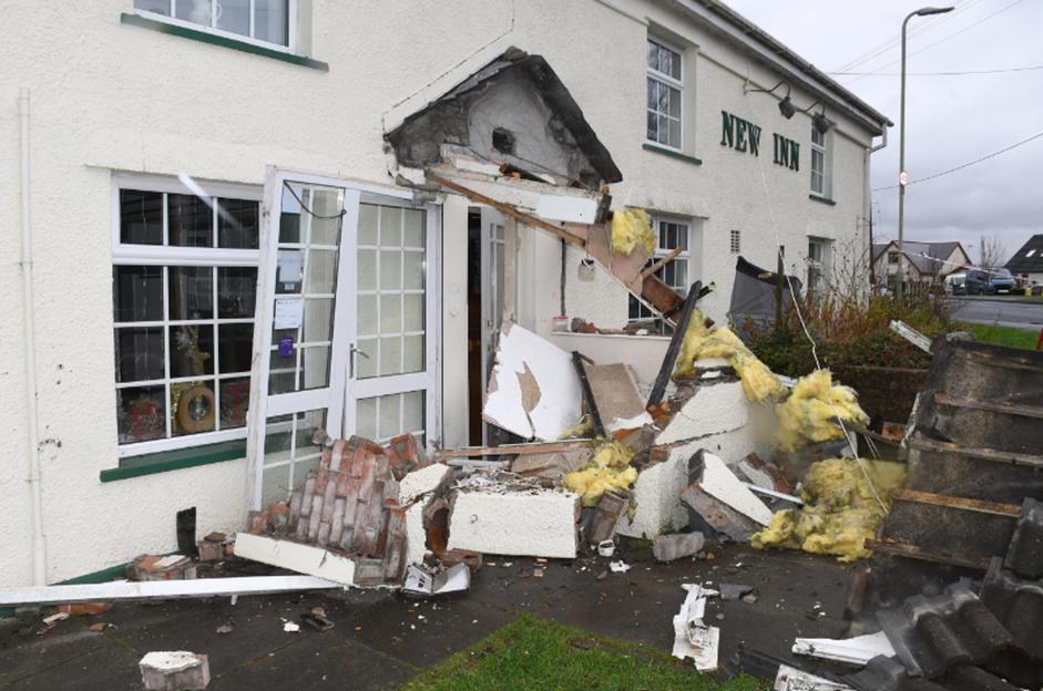 The damaged entrance of the New Inn pub in Cefn Rhigos.