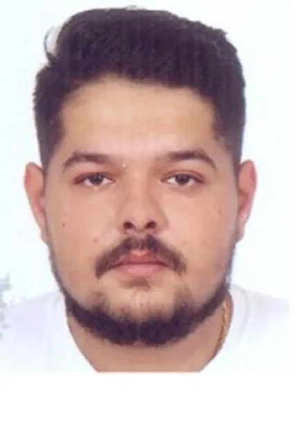 Passport-style photo of Dawid Paczkowski.