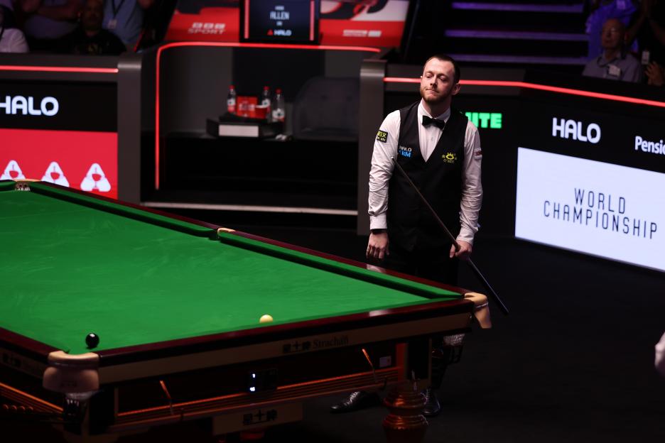 Mark Allen looks disappointed after failing to pot the black ball during the World Snooker Championship semi-final.