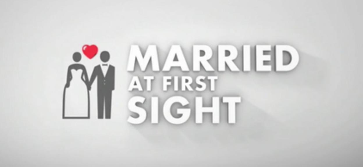 Illustration of the "Married at First Sight" logo with a bride and groom icon holding hands with a red heart above them.