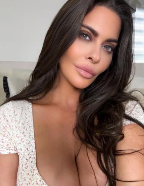 Linsey Dawn McKenzie, a Brit glamour model, in a close-up selfie.