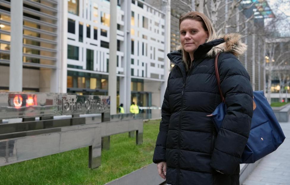 Micala Trussler, mother of Holly Newton, stands outside the Home Office.
