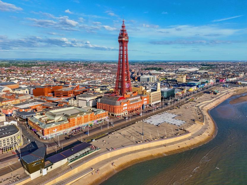 Aerial Image of Blackpool Tower along the Fylde Coast, Lancashire during a lovely Summer evening on the Sea front. 28th July 2024.