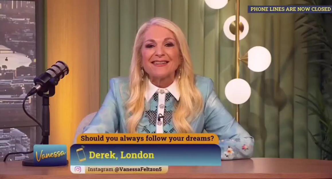 Vanessa Feltz presenting her Channel 5 show, with a microphone and a call-in screen for "Derek, London".