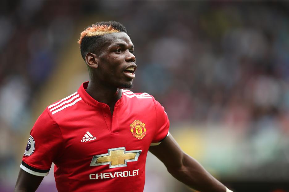 Paul Pogba playing for Manchester United against Swansea City.
