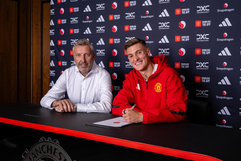 Benjamin Sesko of Manchester United signing for the club with Director of Football Jason Wilcox.