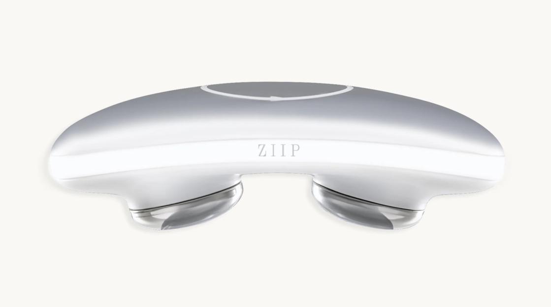 A metallic silver Ziip microcurrent and nanocurrent facial device.