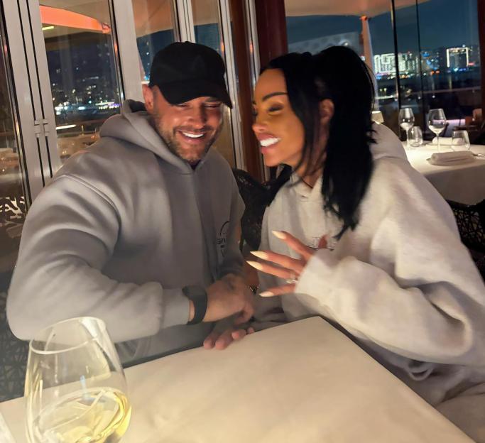 Katie Price and Lee Andrews enjoying a meal.