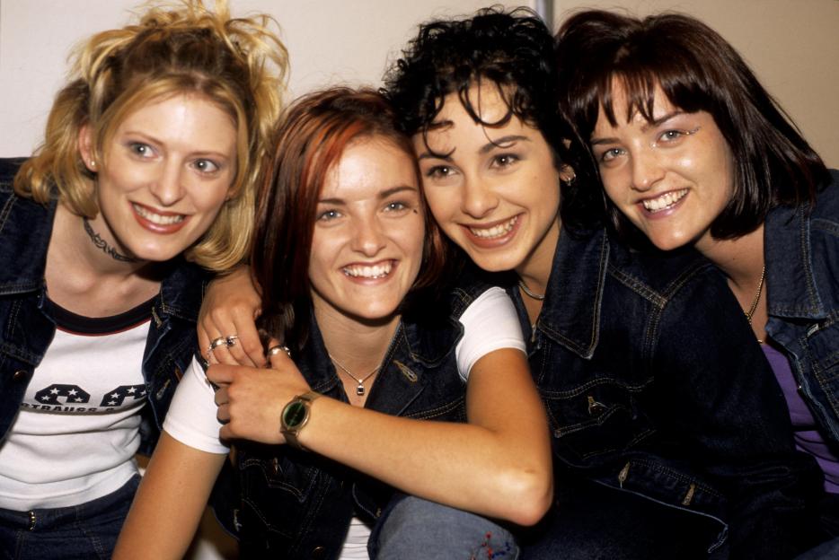 Posed group portrait of B*Witched band members Sinead O'Carroll, Keavy Lynch, Lindsay Armaou, and Edele Lynch.