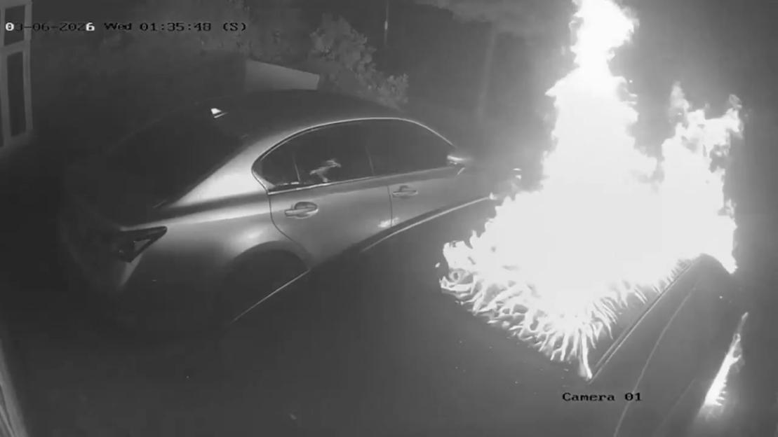 'Shocking Footage: Car Engulfed in Flames as Arsonist Douses It with Petrol at Politician's Residence'