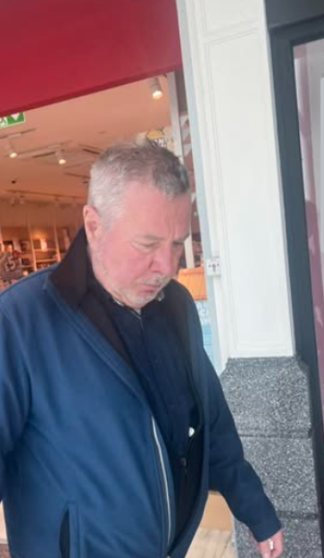 CCTV image of a man wanted in connection with a voyeurism investigation.