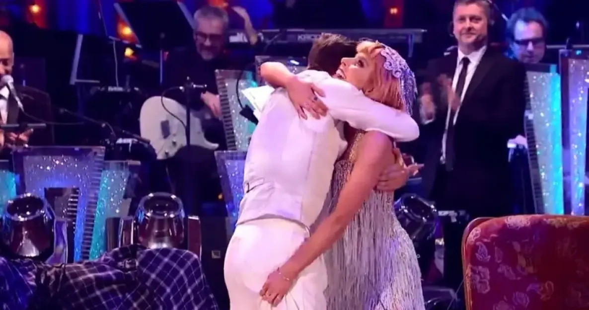 Stacey Dooley and Kevin Clifton embracing on Strictly Come Dancing.