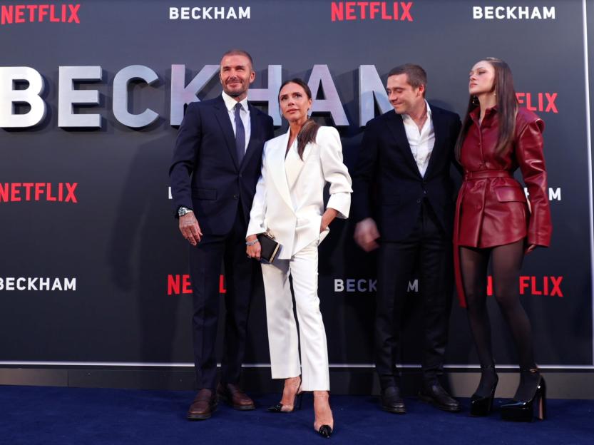 Catch the Dramatic Moment Brooklyn Includes a Fuming Nicola in the Beckham Family Photo at the Premiere!