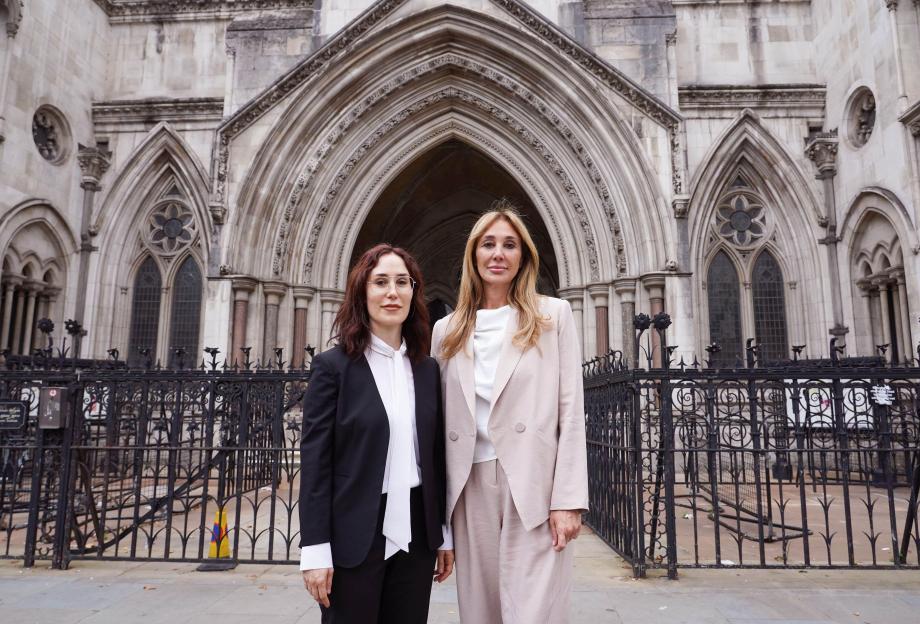 Rachel Cherwitz and Nicole Daedone in front of the Royal Courts of Justice.