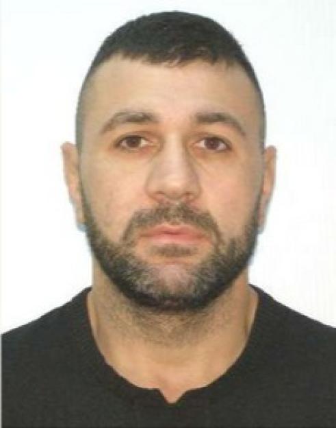 Headshot of Adrian Preda, a man wanted in Romania for attempted murder and mob crime.