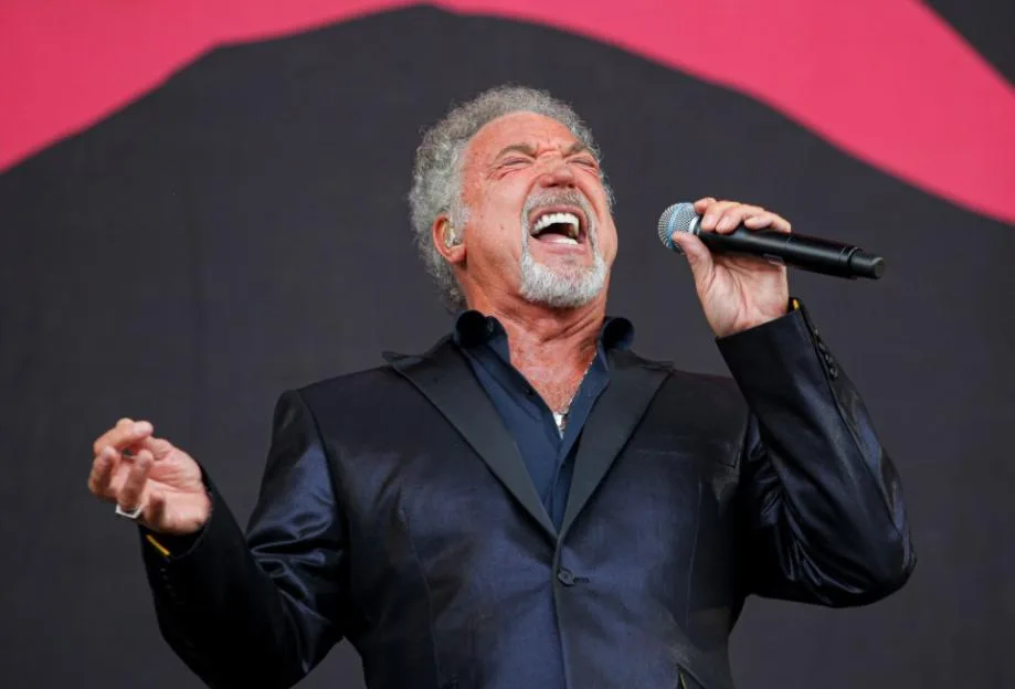 Tom Jones performs on stage at the Glastonbury Festival.