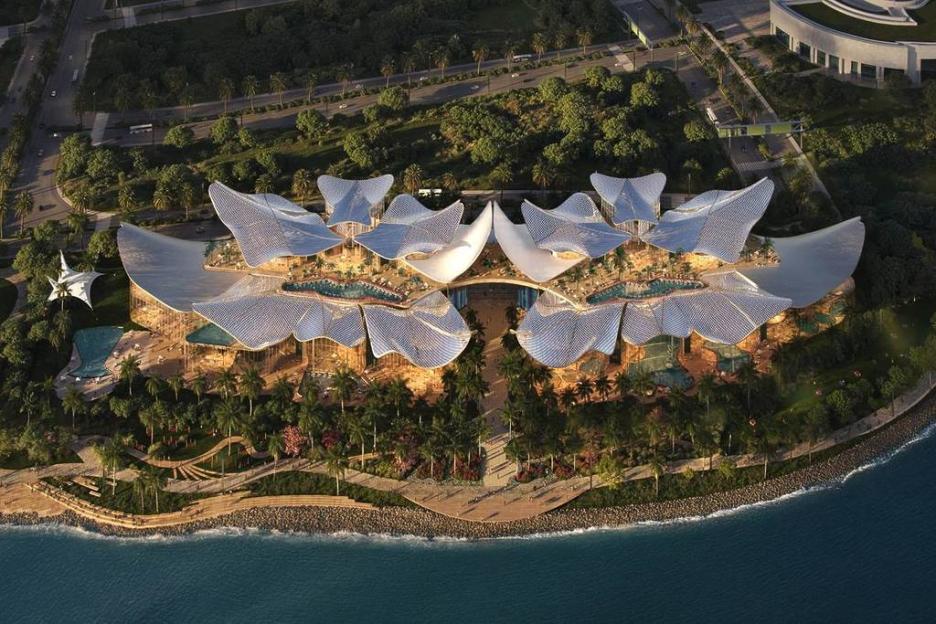 Illustration of the Therme Singapore wellness sanctuary with multiple wavy roofs, thermal pools, and surrounding coastal nature.