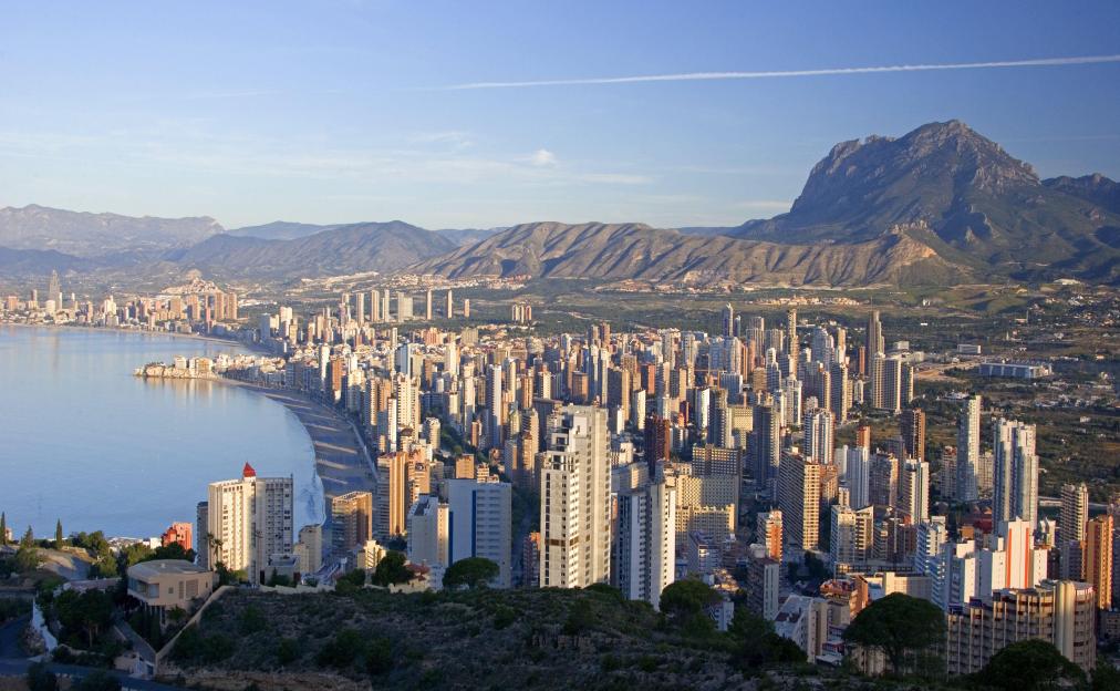 Spain, Alicante, Costa Blanca, Benidorm, town view, sunrise, coast, coastal region, holiday resort, seaside resort, tourist resort, high rises, buildings, hotels, beach, beach, destination, vacation, holidays, tourism, the morning sun,